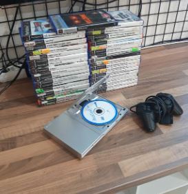 Lote de ps2 plata slim con 35 juegos